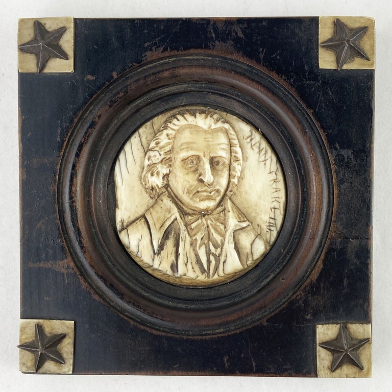 Item #3590 [Miniature Folk Art Portrait of Benjamin Franklin Engraved on Horn and Mounted in a Wooden Frame]. Benjamin Franklin.